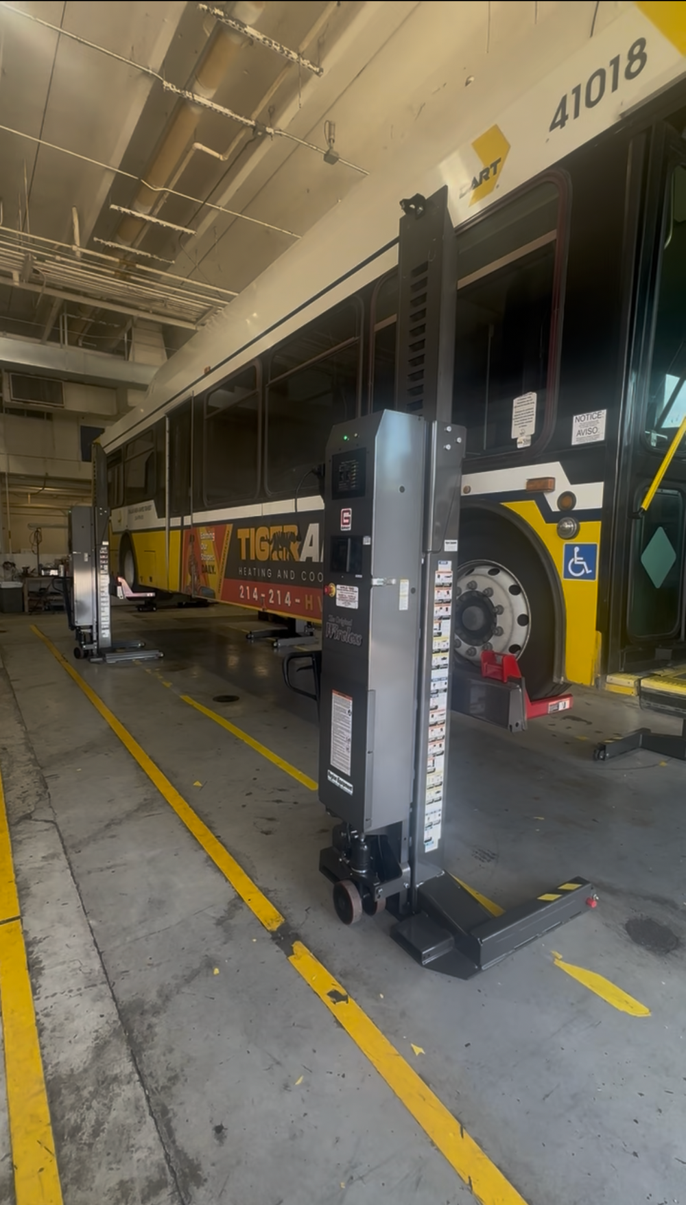 Vehicle lifts and compressed air systems in a fleet maintenance shop