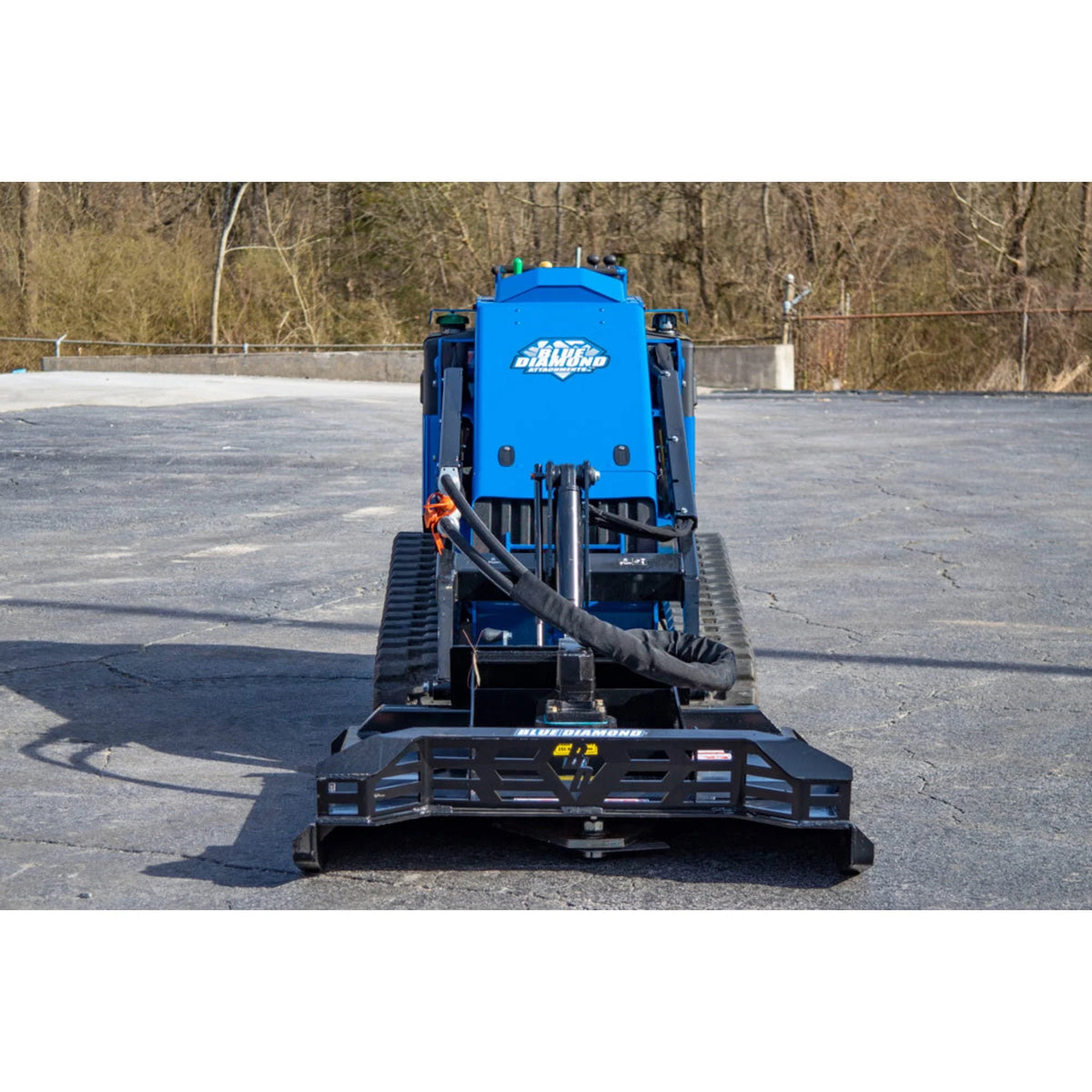 Blue Diamond mini skid steer open-front brush cutter mounted on mini track loader, front view