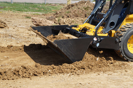 Blue Diamond Bucket — 4-in-1 — mounted on a loader with the bucket open