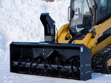 Blue Diamond Snow Blower — Extreme Duty — mounted on a skid steer in snow