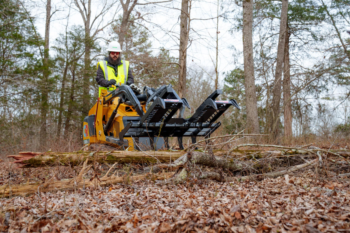 FECON Red Line BG48 Mini Skid Brush Grapple in operation