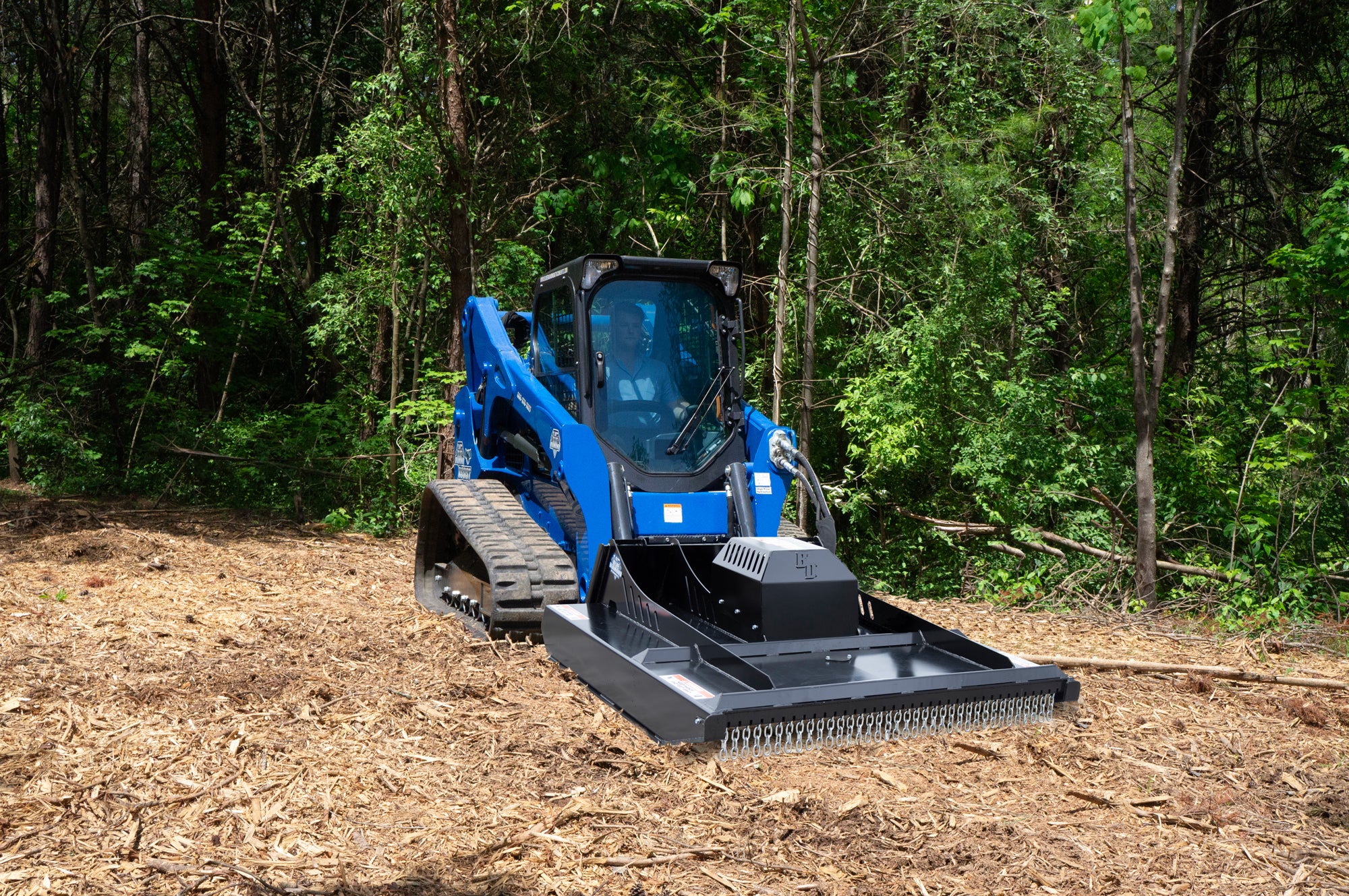 Blue Diamond heavy duty series 2 closed front brush cutter mounted on a skid steer