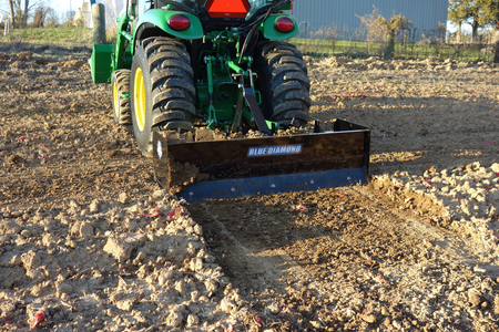 Blue Diamond Heavy Duty Compact Tractor Box Blade Scraper — mounted on a tractor grading soil