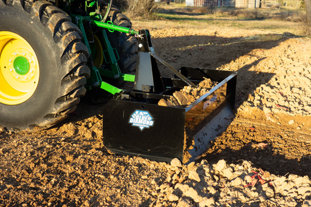 Blue Diamond Heavy Duty Compact Tractor Box Blade Scraper — close-up of the box blade working soil