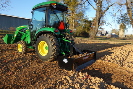 Blue Diamond Heavy Duty Compact Tractor Box Blade Scraper — rear view of the tractor and box blade