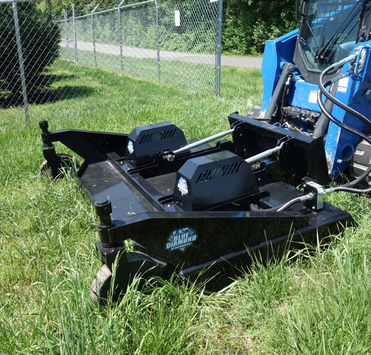 Blue Diamond 84 in. Dual Spindle Brush Cutter — mounted on a compact track loader cutting grass