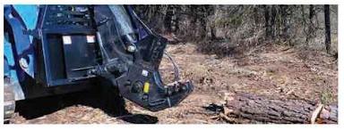 Blue Diamond Tree Shear — mounted on a compact track loader cutting a tree
