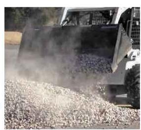 Blue Diamond General Purpose Bucket — mounted on a loader handling loose material