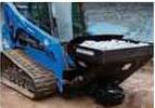 Blue Diamond Material Spreader — mounted on a compact track loader
