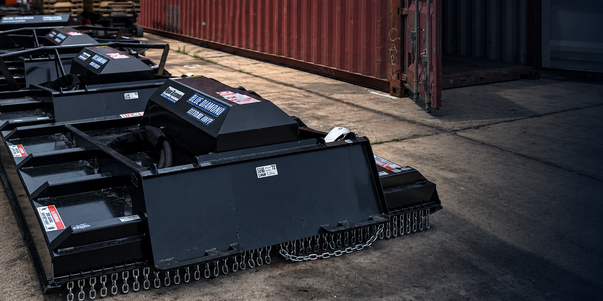 Blue Diamond brush cutter attachments lined up at the Region Equipment yard